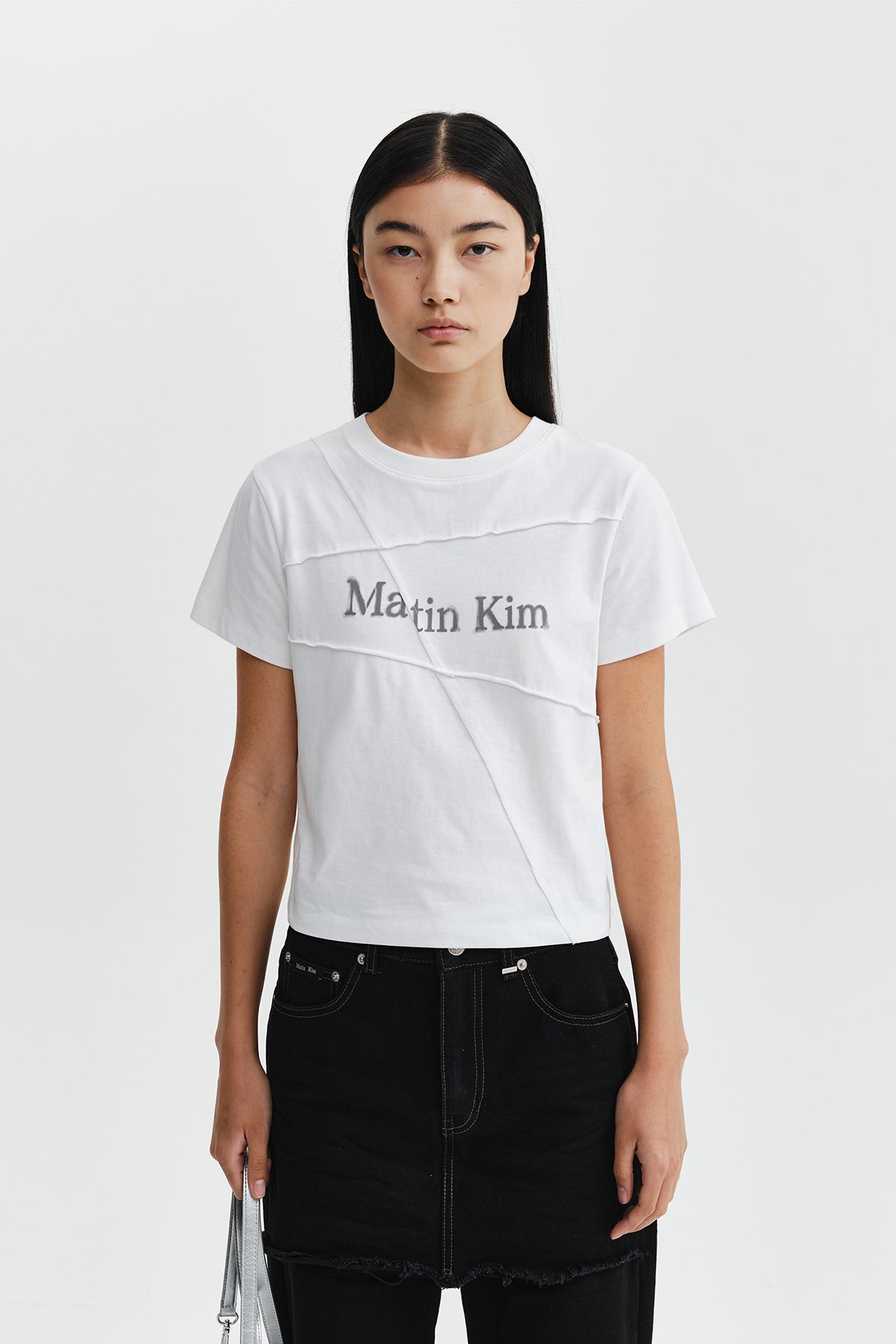 DIAGONAL CUT LOGO CROP TOP IN WHITE
